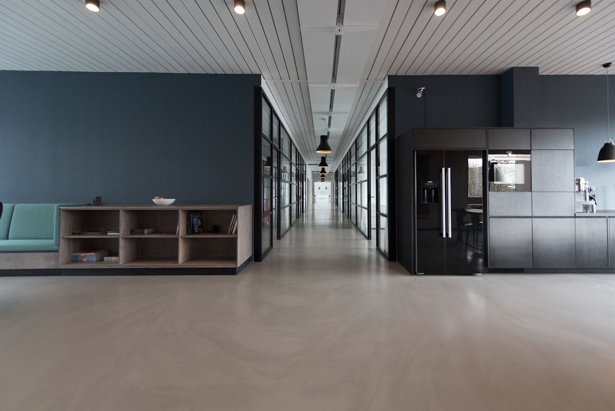 Modern office workspace with laptops and clean desk setup